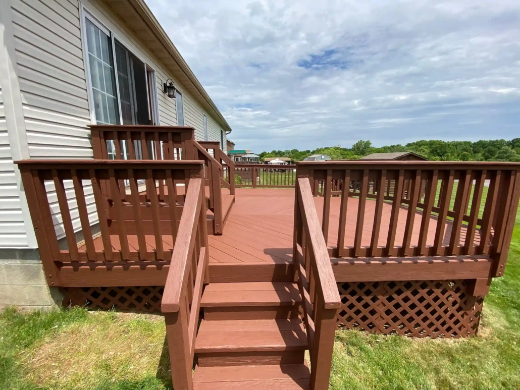 A Fresh Stained Deck in Austintown is Shined on from the Sunny Blue Sky.