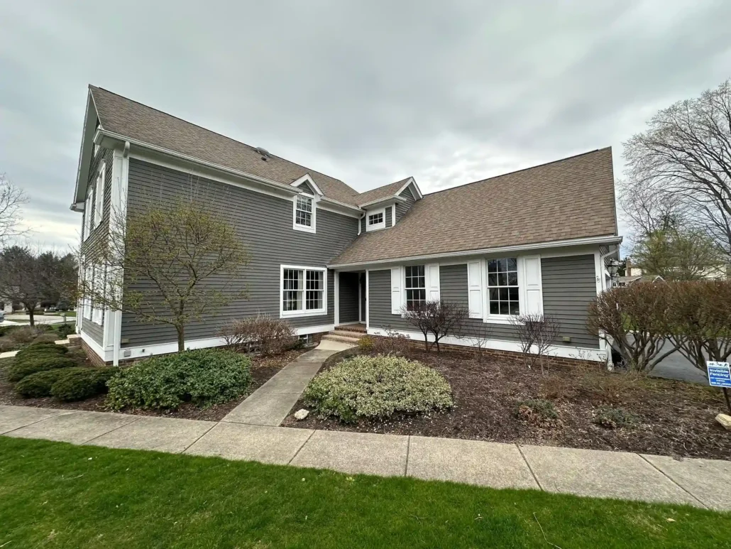 A Newly Painted Gray Home with White Trim in Austintown.