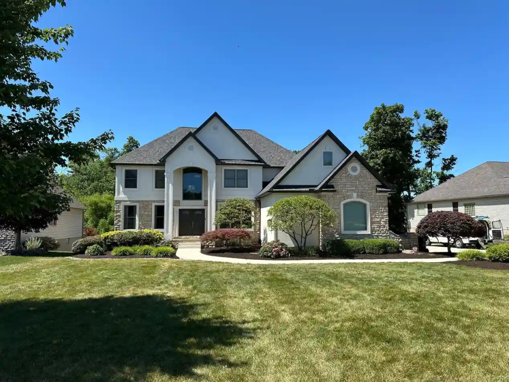 Fresh, White Painted Exterior in New Middletown Reflects the Afternoon Fall Sun.