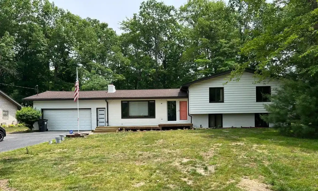 Freshly Painted White Ranch Style Home in Poland, OH with Black Trim and Accents.