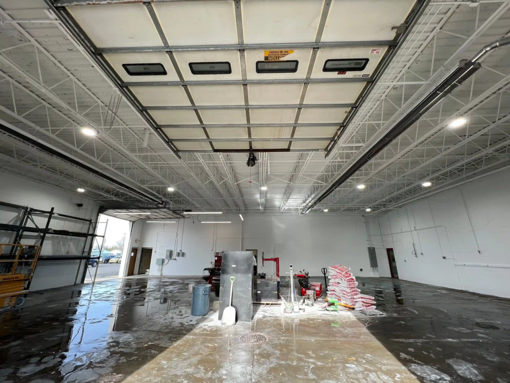 Equipment Sits Organized in the Middle of a Flex Industrial Storage Building Completed by a Commercial Painting Company in Mahoning Valley.